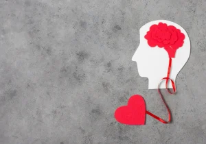 Illustrasjon som symboliserer forbindelsen mellom hjertet og hjernen, relevant for temaet mental helse og emosjonelt velvære innen mental helse.